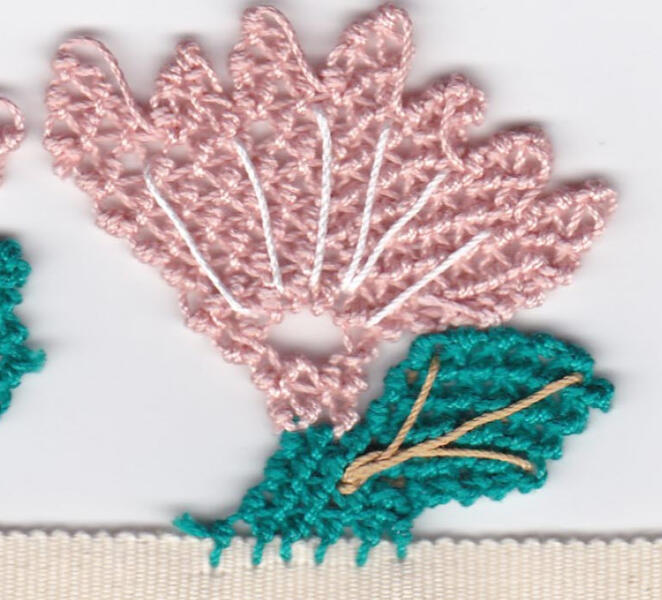 Joan's fan flower lace edging from the new handout available in the store or on Amazon for Kindle.